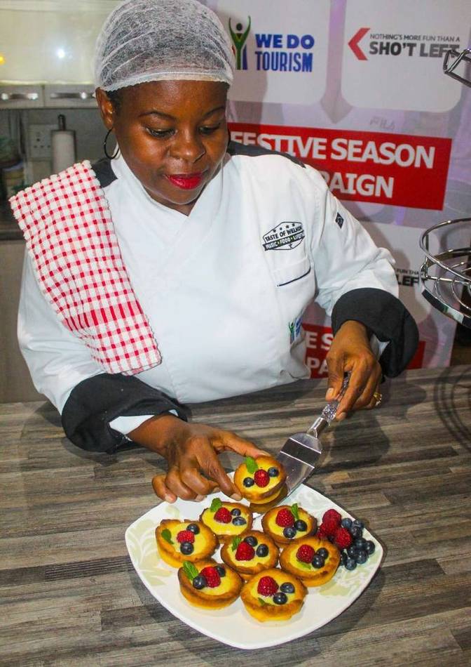 A chef preparing food during the Festive Season giving campaign
