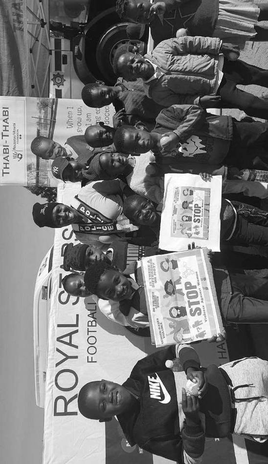 Bikers carrying STOP placards during the awareness campaign